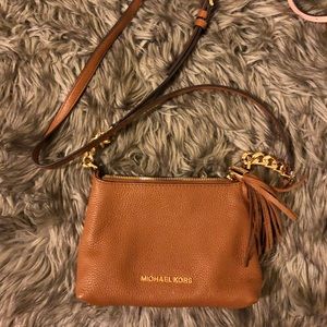 SOLD:Brown Michael Kors crossbody.